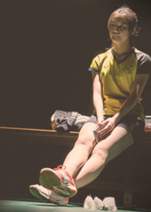 athlete sitting alone