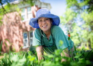woman in hat gardening