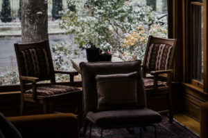 chairs sitting outside on the porch