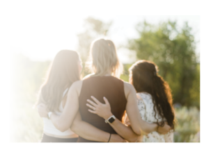Faded picture of girls looking into the sun