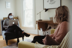woman talking to a therapist